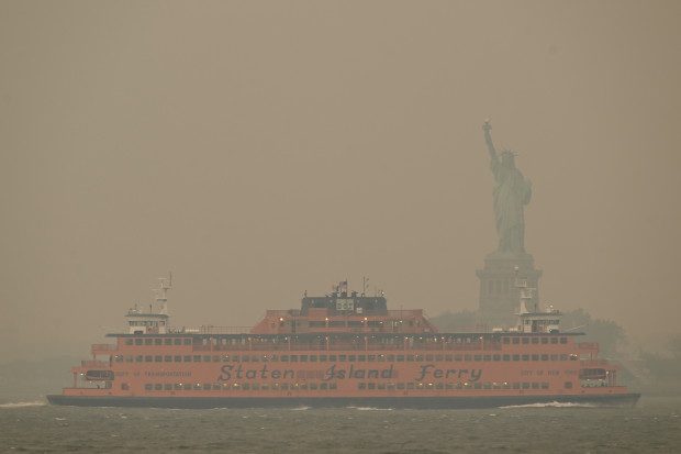 Eerie Photos Show NYC Landmarks Shrouded in Wildfire Haze 4 Eerie Photos Show NYC Landmarks Shrouded in Wildfire Haze