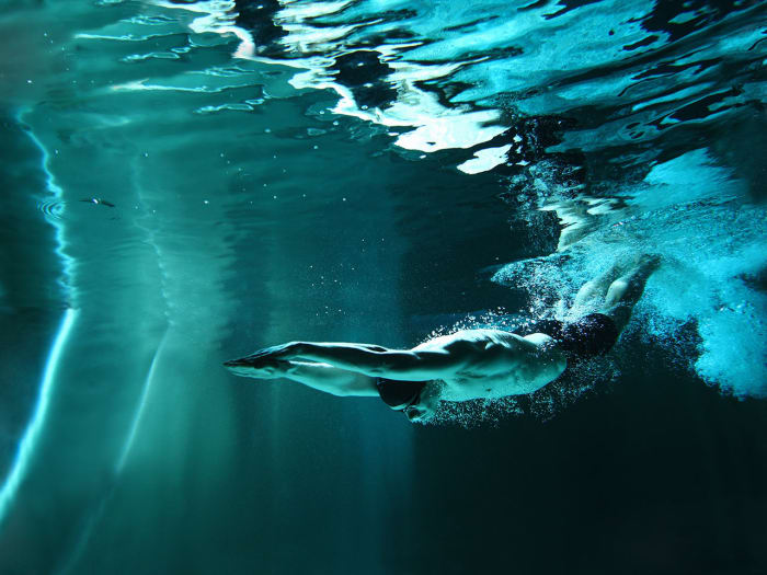 Swimming for Cardio How to Burn Off Calories in the Pool Men's Journal