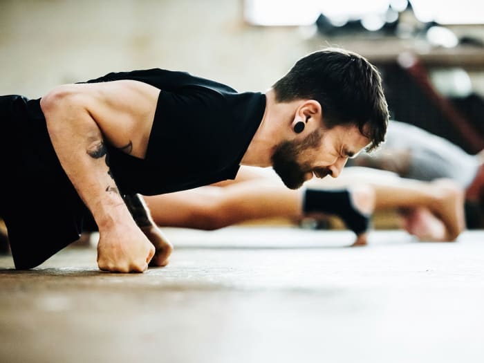 Why Does My Elbow Hurt During Workouts? Men's Journal