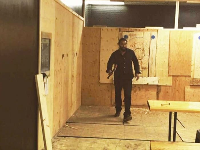 Watch Jason Momoa drink beer and throw an axe like a true grizzly man Men's Journal