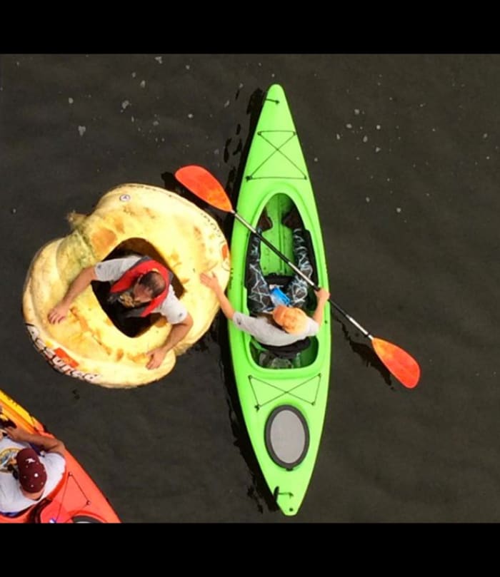 Man in 1200Pound Pumpkin Boat Sets World Record in Kayak Race Men's