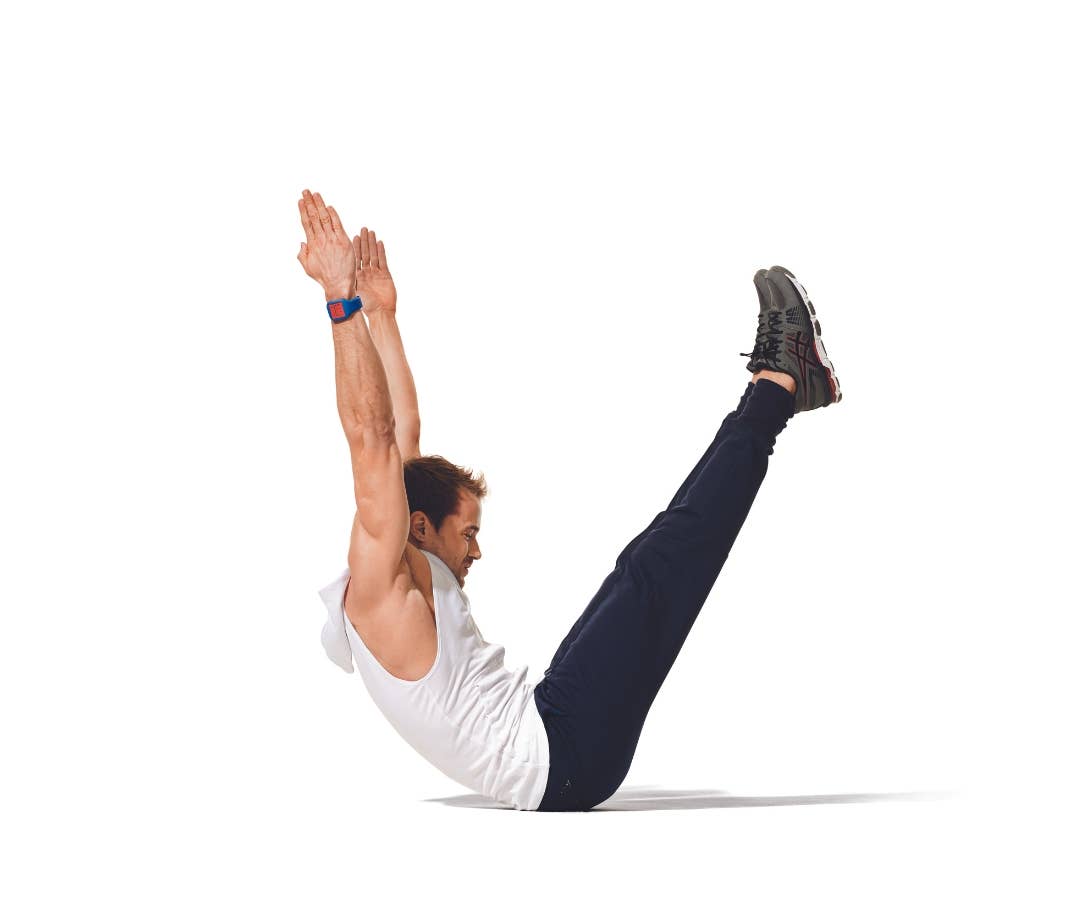 Best Ab Workouts At Home: Caucasian man performs boast pose/v-up