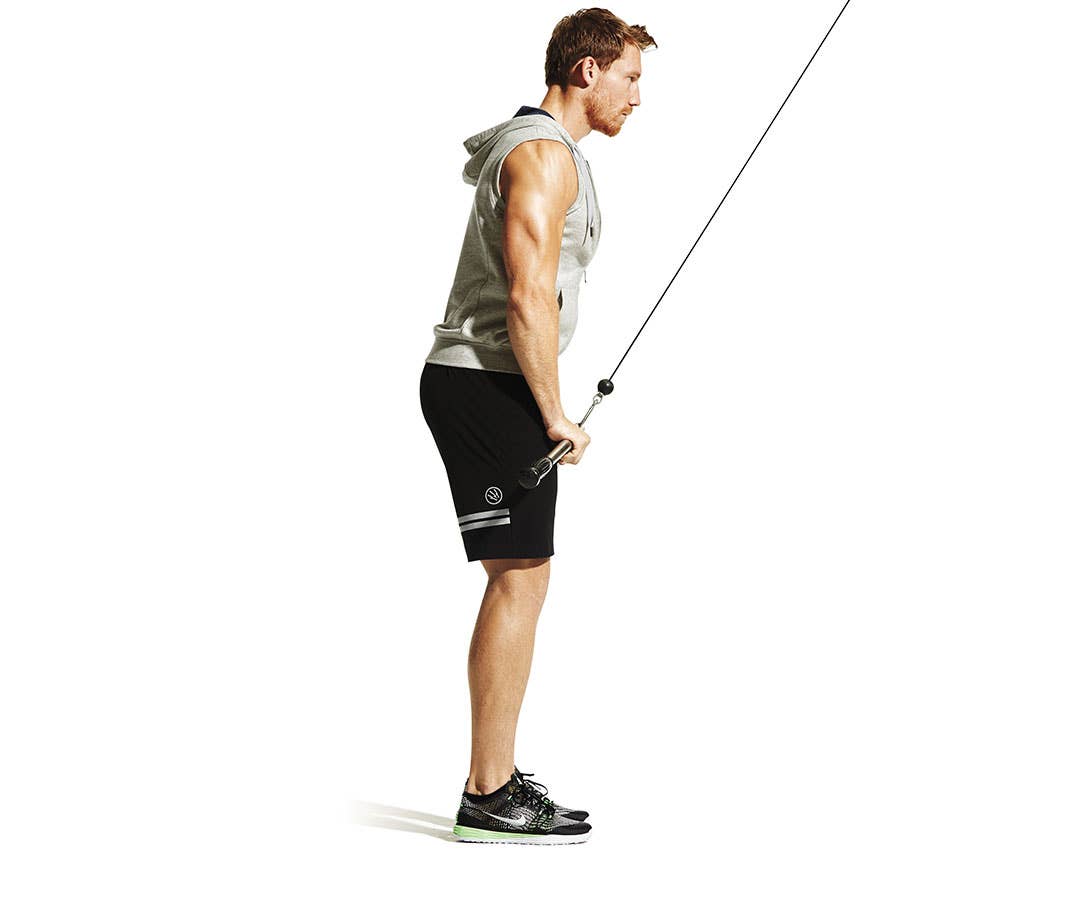 Caucasian man doing lat pulldown