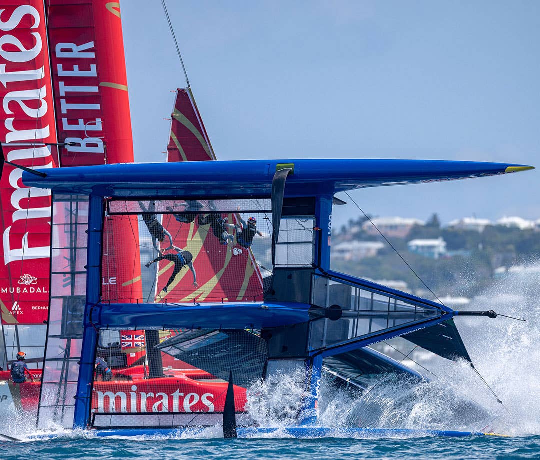 SailGP U.S. boat racers falling from boat during capsize.