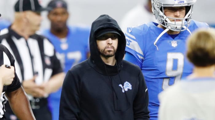 Eminem takes the field for the coin toss prior to the game between the New York Jets and Detroit Lions at Ford Field on September 10, 2018 in Detroit, Michigan.