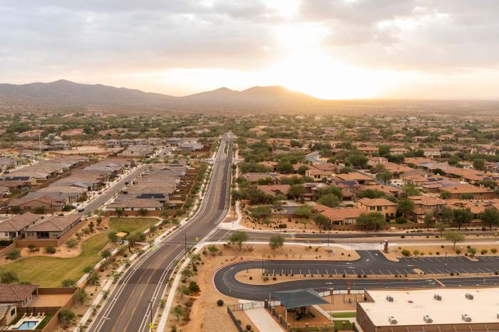 EPA Issues Health Warning to Residents - Aerial View Landscape Of Road And Mountain Buttes Residential Area In Phoenix Arizona On Orange