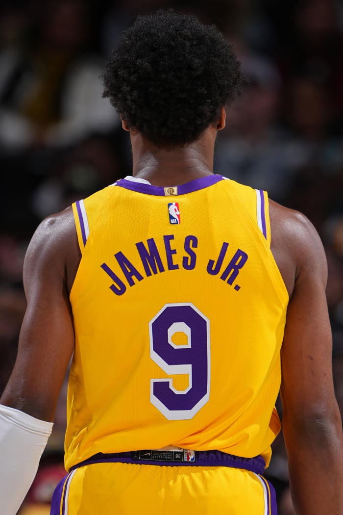 DENVER, CO - MARCH 14: Bronny James #9 of the Los Angeles Lakers looks on during the game against the Denver Nuggets on March 14, 2025 at Ball Arena in Denver, Colorado. NOTE TO USER: User expressly acknowledges and agrees that, by downloading and/or using this Photograph, user is consenting to the terms and conditions of the Getty Images License Agreement. Mandatory Copyright Notice: Copyright 2025 NBAE(Photo by Garrett Ellwood/NBAE via Getty Images)