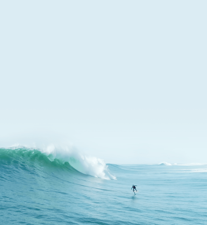 Laird Hamilton and Crew Surf Massive Waves at Nazaré on Foil Boards