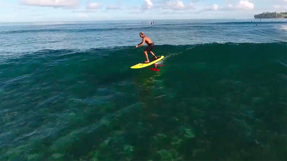 Laird Hamilton riding a SUP hydrofoil is an early Christmas present