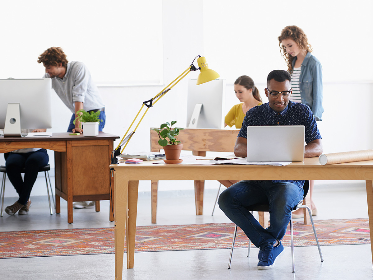 7 Muscle-Building Exercises You Can Do at Your Desk - Men's Journal