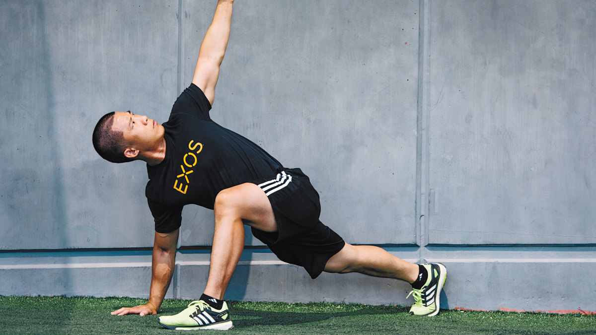 Group of people doing stretching exercises. – Johnson Fitness and Wellness