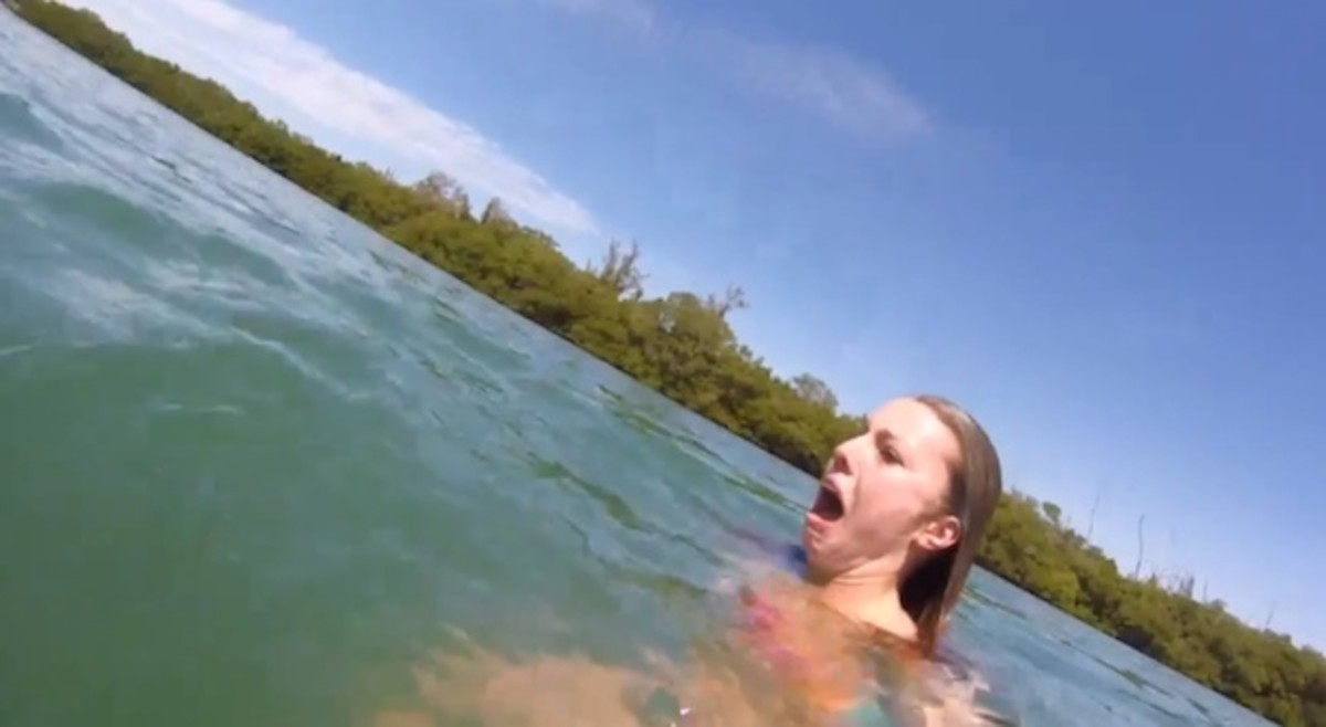 Woman on spring break freaks out in presence of docile manatee Men's