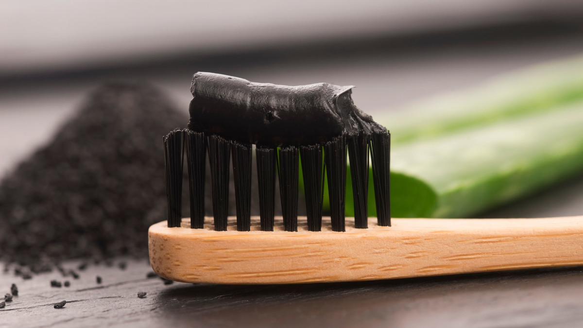 Brushing Your Teeth With Charcoal Toothpaste Could Damage Enamel Men