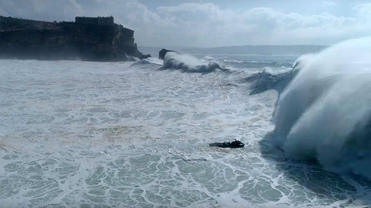 Jet Ski Nearly Collides With Surfers in Video of Harrowing Nazaré Wipeout Men's Journal