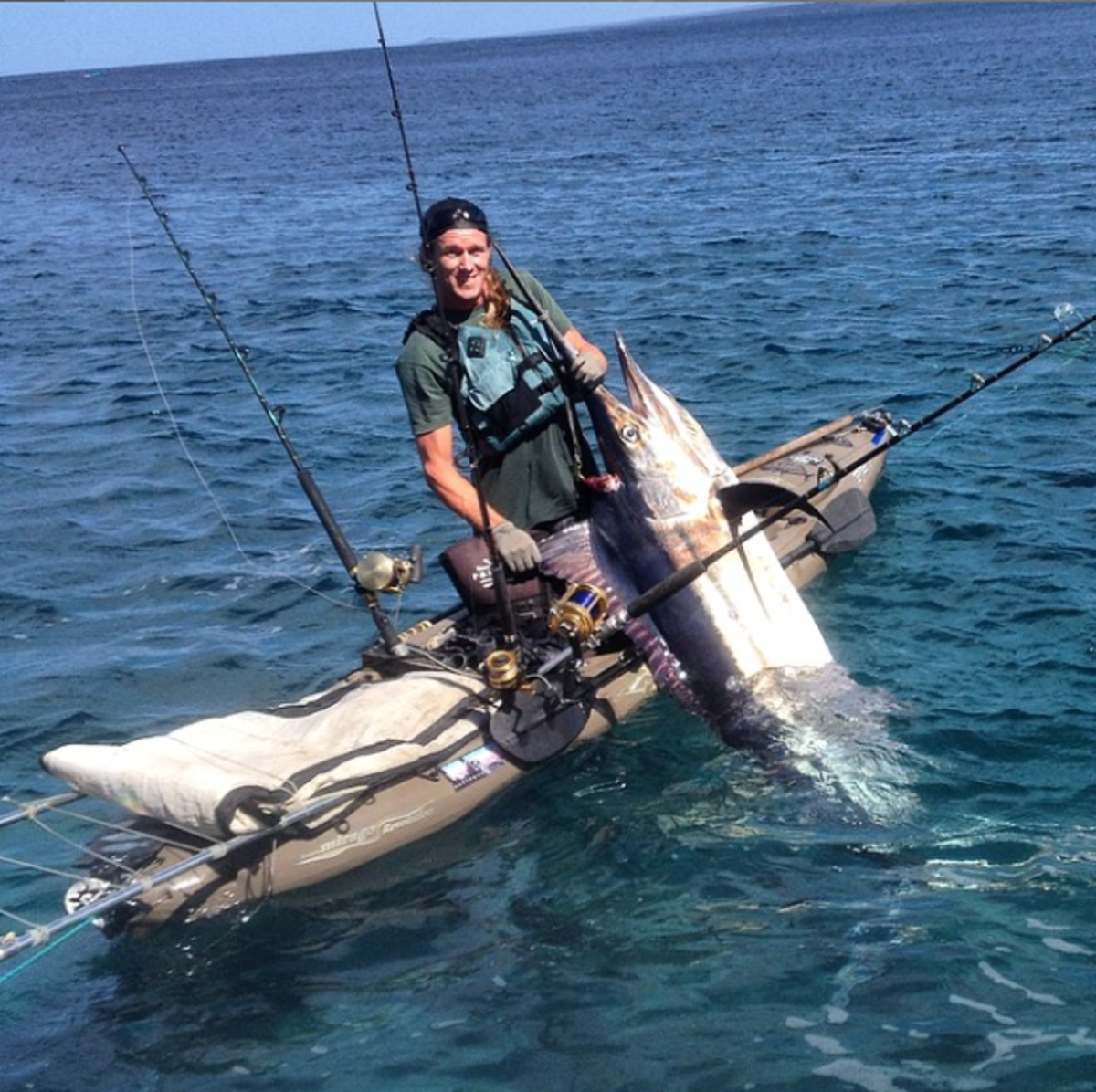 Kayak angler tosses rod overboard, catches record marlin Men's Journal