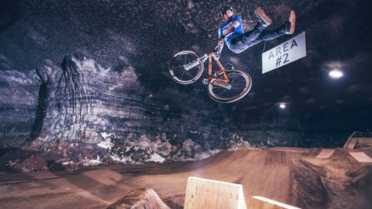 Watch Pro Cyclists Get Big Air in the World’s Largest Indoor Bike Park