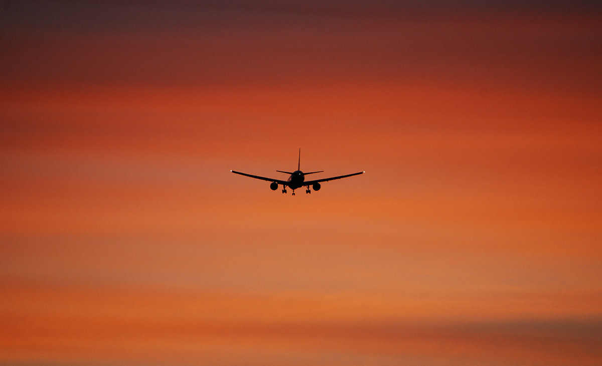 A Look Into the Changing Tides of Airline Surfboard Baggage Fees Men