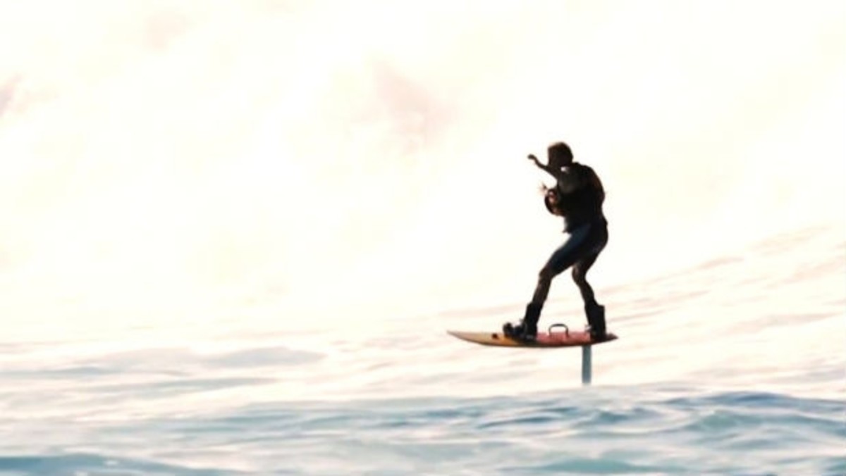 Watch Laird Hamilton Dominate Waves With His Foilboard Men's Journal