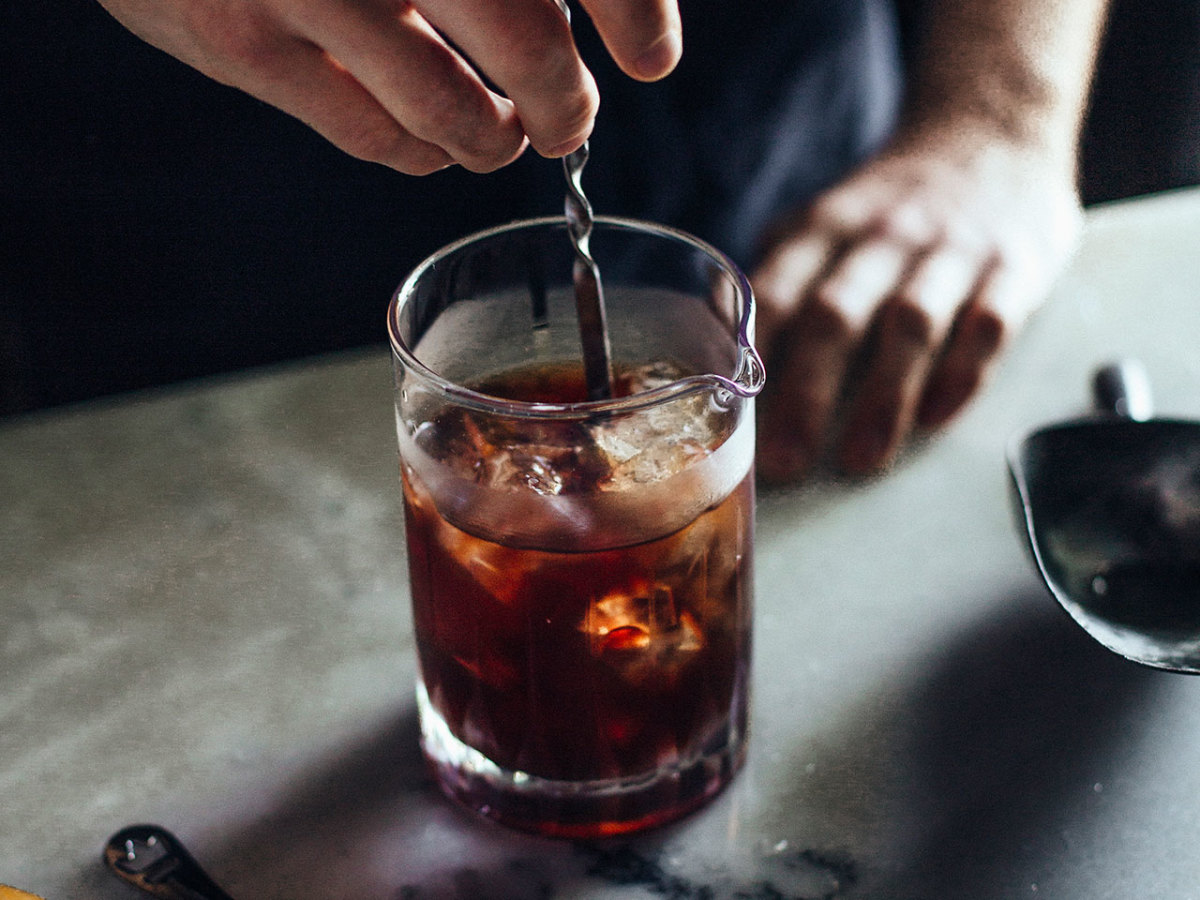 Bourbon, Lemon, and Tonic Cocktail Men's Journal