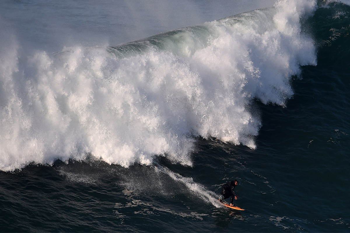 Brazilian Surfer Rodrigo Koxa Sets World Record with 80foot Wave Ride