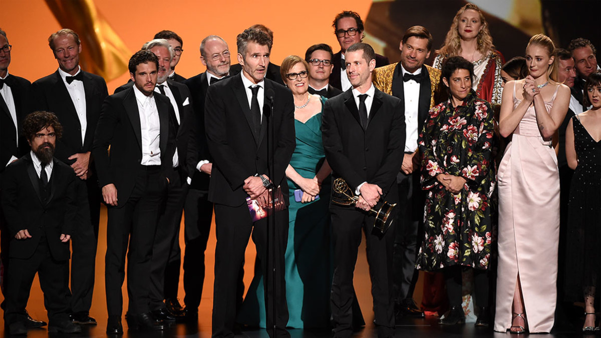 Cast and crew of Game of Thrones, winners of the award for Outstanding  Writing for a Drama Series, appear backstage during the 70th annual  Primetime Emmy Awards at the Microsoft Theater in