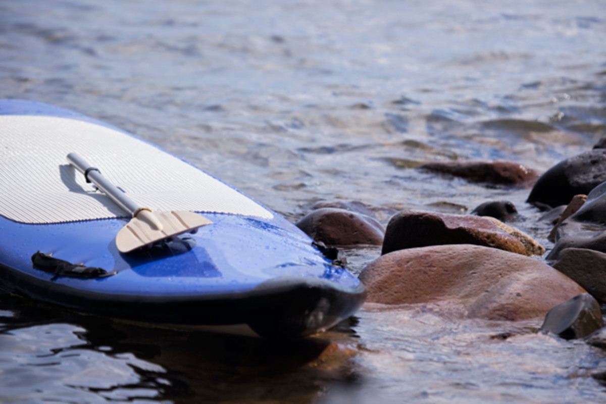 Paddleboard core strengthening yoga workout Men's Journal