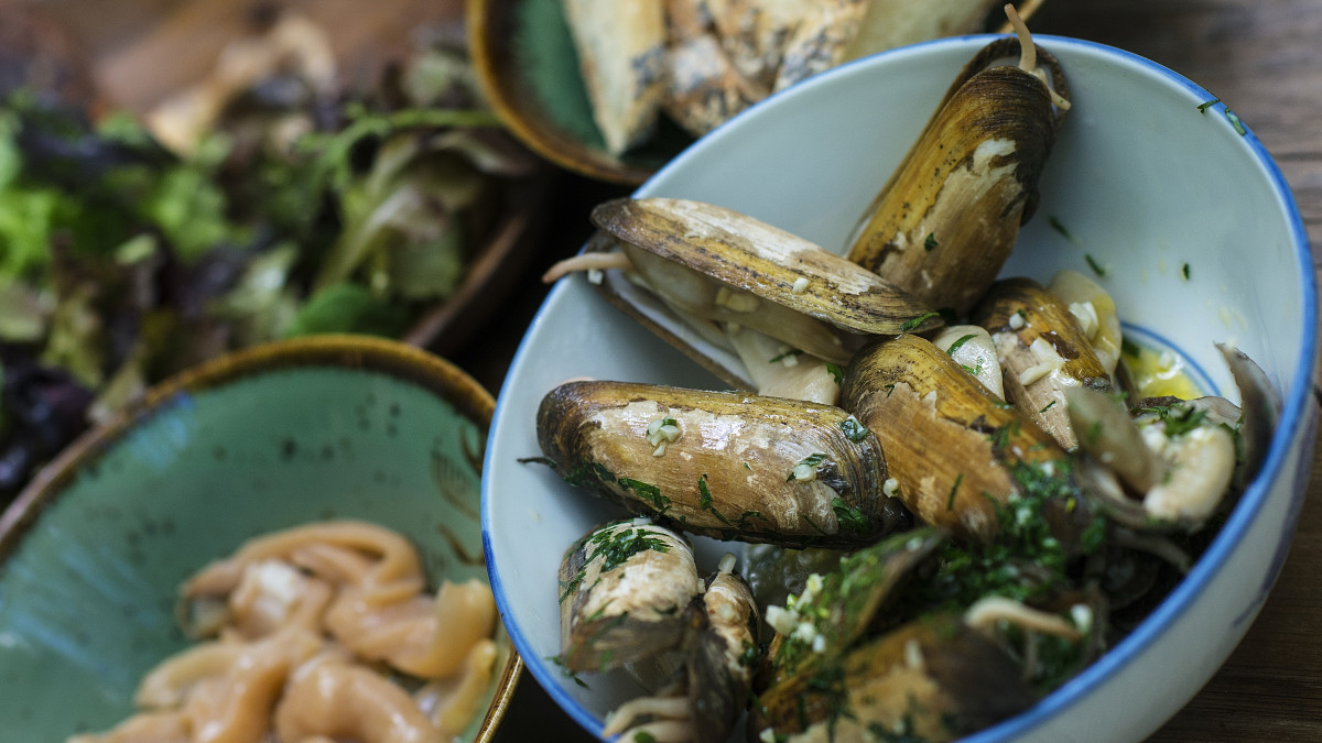 How to Grill Razor Clams With Bacon and Green Garlic Men's Journal