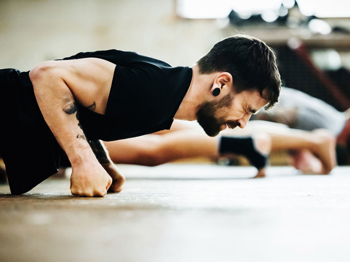 Why Does My Elbow Hurt During Workouts? Men's Journal