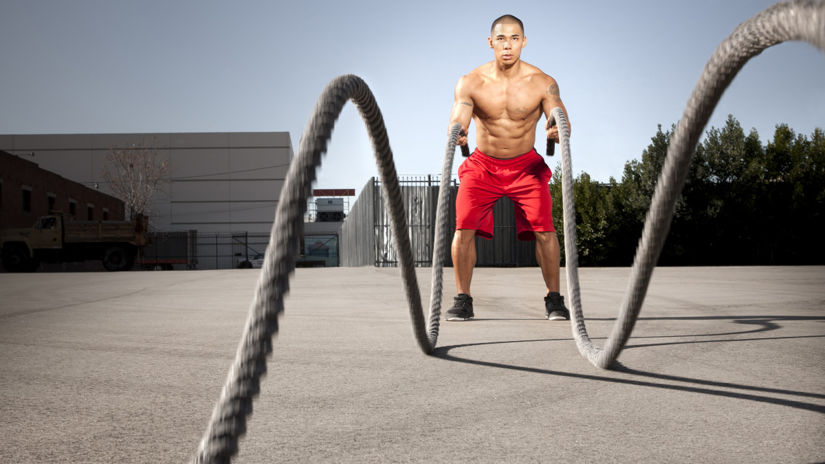 5 Combat Rope Moves to Torch Your Metabolism Men s Journal