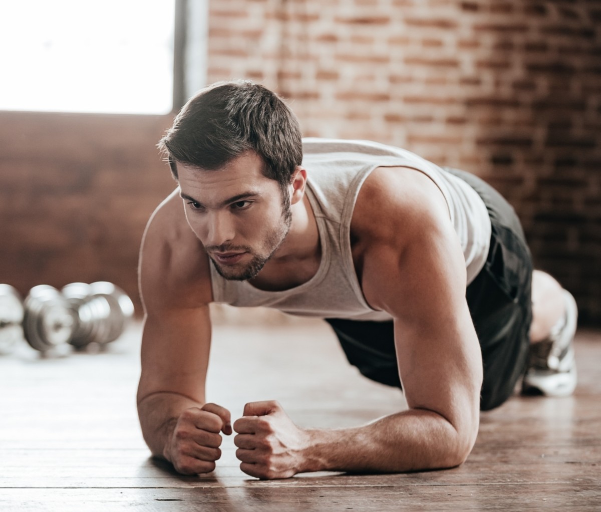 Man doing a plank. abs exercises