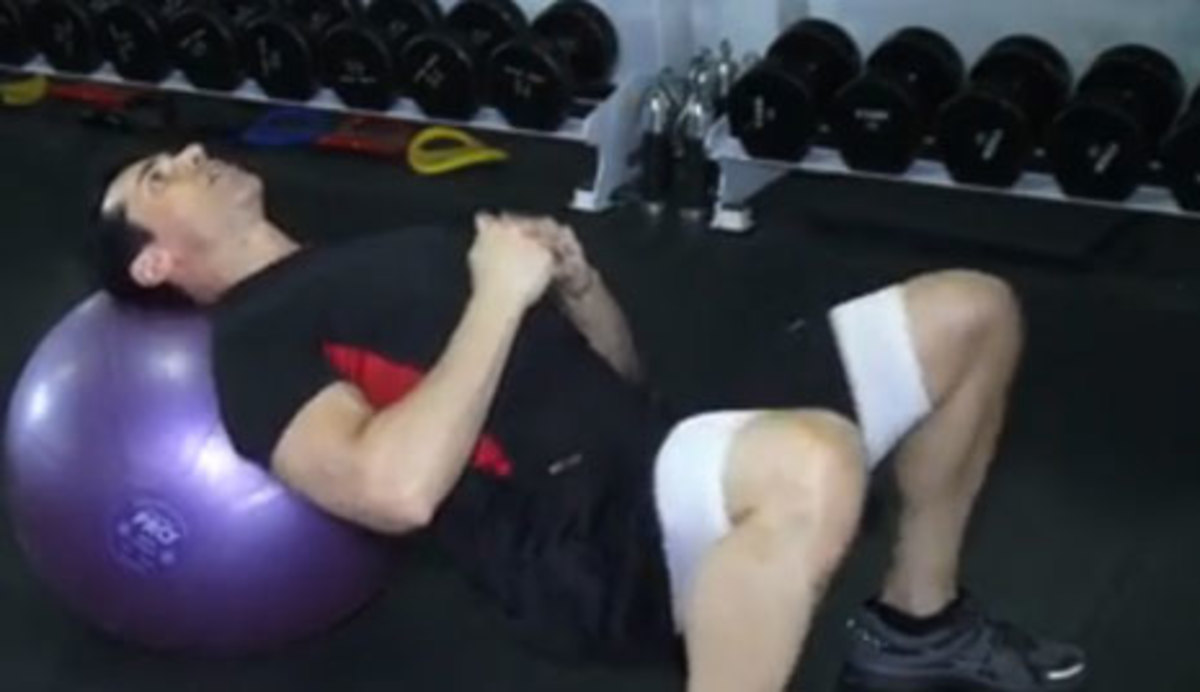 Exercise to Know Swiss Ball Neck Bridge Men's Journal