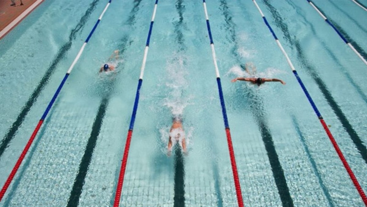 9 Best Swimming Workouts for Summer Men's Journal