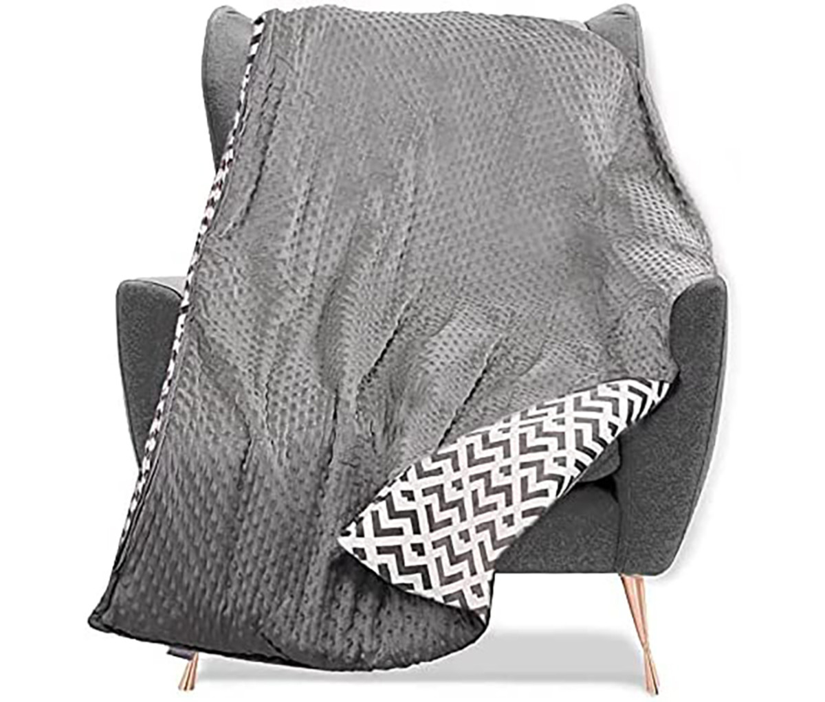 This Quility Weighted Blanket is Perfect for a Cozy Fall Night Men's Journal