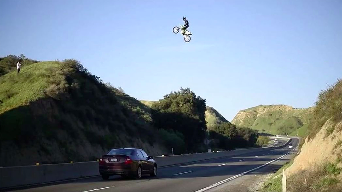 Dirt bike rider who jumped over freeway critically injured jumping