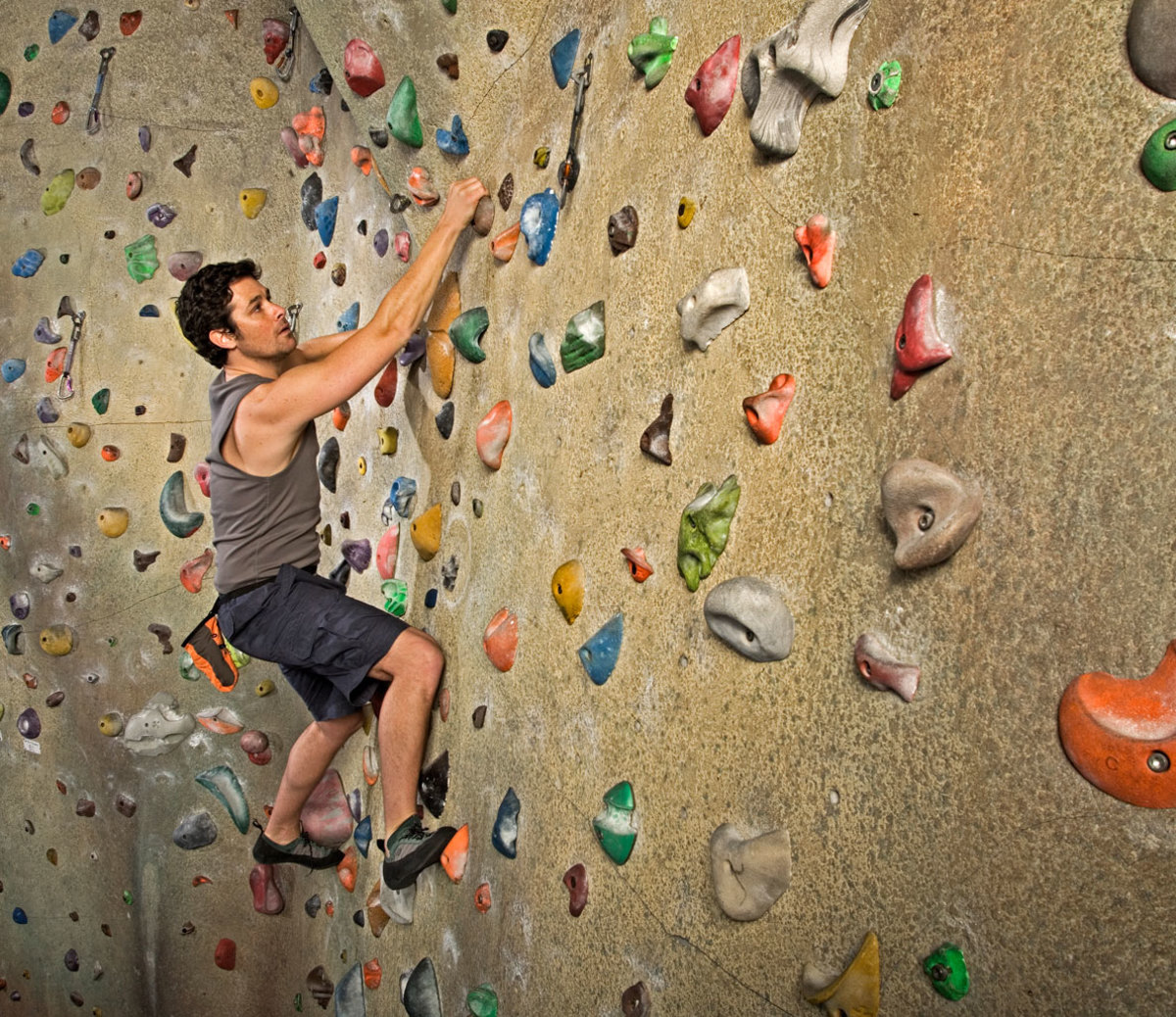 Ask Men's Fitness "Is Indoor Rock Climbing a Good Workout?" Men's