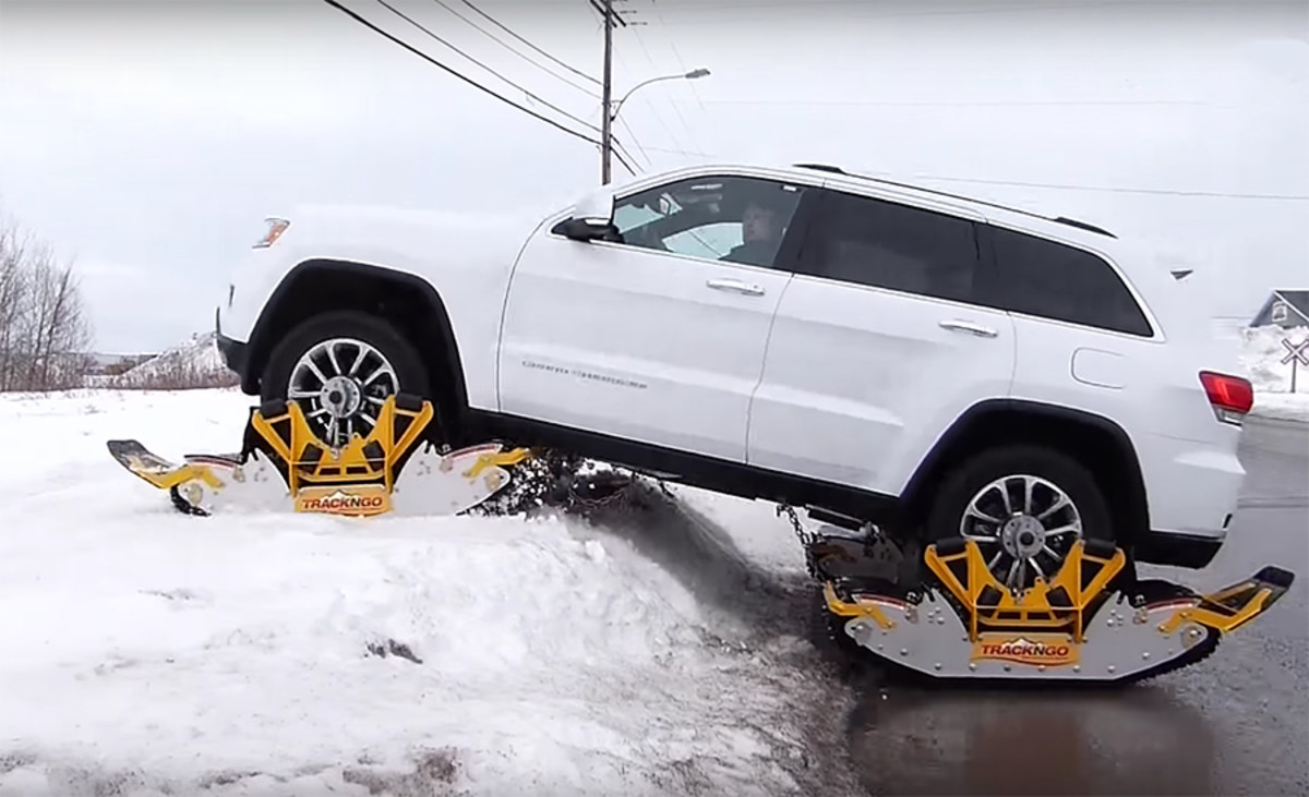 Snow is no match for Jeeps mounted on portable tread system - Men's Journal
