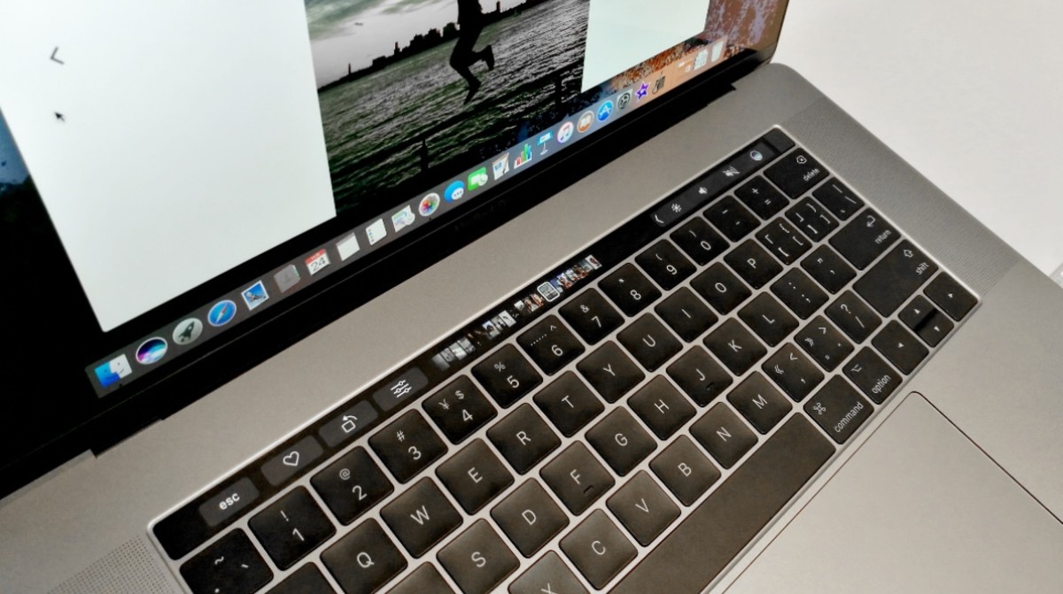 Apple Discontinuing Touch Bar MacBook Feature After Seven Years - Men's  Journal