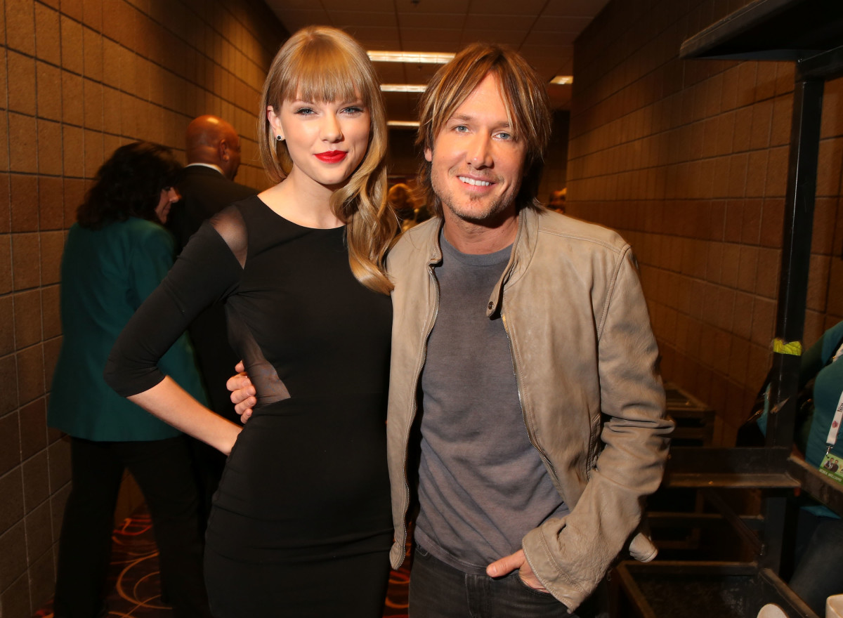 LAS VEGAS, NV - APRIL 08:  Musicians Taylor Swift (L) and Keith Urban attend Tim McGraw's Superstar Summer Night presented by the Academy of Country Music at the MGM Grand Garden Arena on April 8, 2013 in Las Vegas, Nevada.  (Photo by Chris Polk/ACMA2013/Getty Images for ACM)