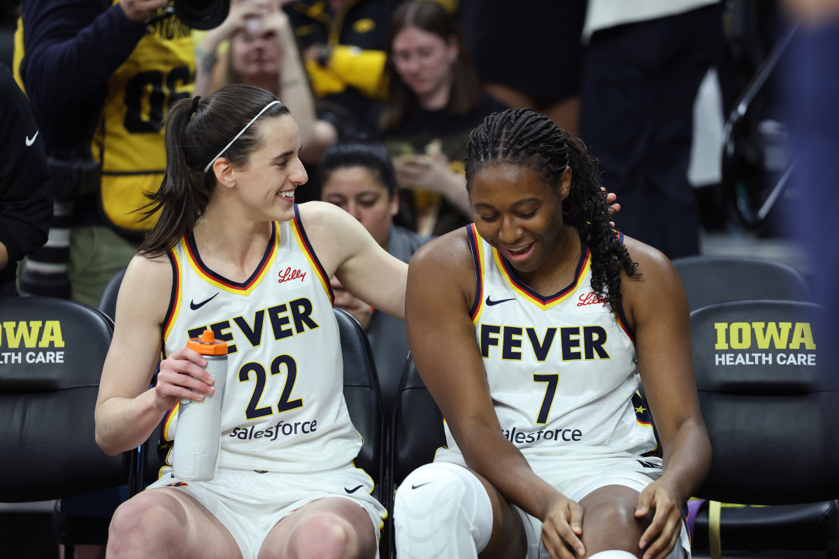 IOWA CITY, IA - MAY 4: Caitlin Clark #22 and Aliyah Boston #7 of the Indiana Fever smile before the game against the Brazil Women's National Basketball Team during the WNBA preseason game on May 4, 2025 at Carver-Hawkeye Arena in Iowa City, Iowa. NOTE TO USER: User expressly acknowledges and agrees that, by downloading and or using this photograph, User is consenting to the terms and conditions of the Getty Images License Agreement. Mandatory Copyright Notice: Copyright 2025 NBAE (Photo by Jeff Haynes/NBAE via Getty Images)