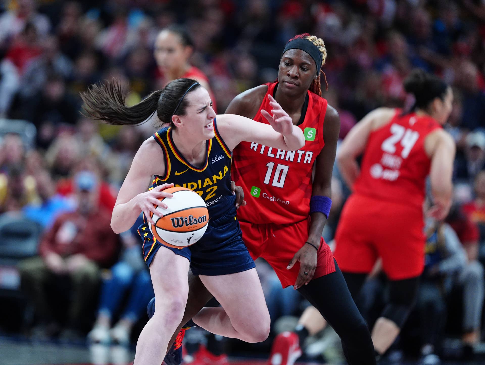 INDIANAPOLIS, IN - MAY 20: Indiana Fever guard Caitlin Clark (22) drives to the basket against Atlanta Dream guard Rhyne Howard (10) on May 20, 2025, at Gainbridge Fieldhouse in Indianapolis, Indiana. (Photo by Brian Spurlock/Icon Sportswire via Getty Images)