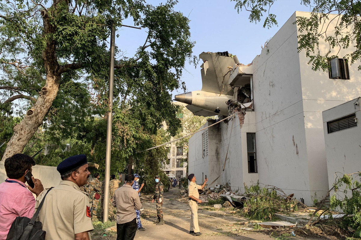 The back of Air India flight 171 is pictured at the site after it crashed in a residential area near the airport in Ahmedabad on June 12, 2025.