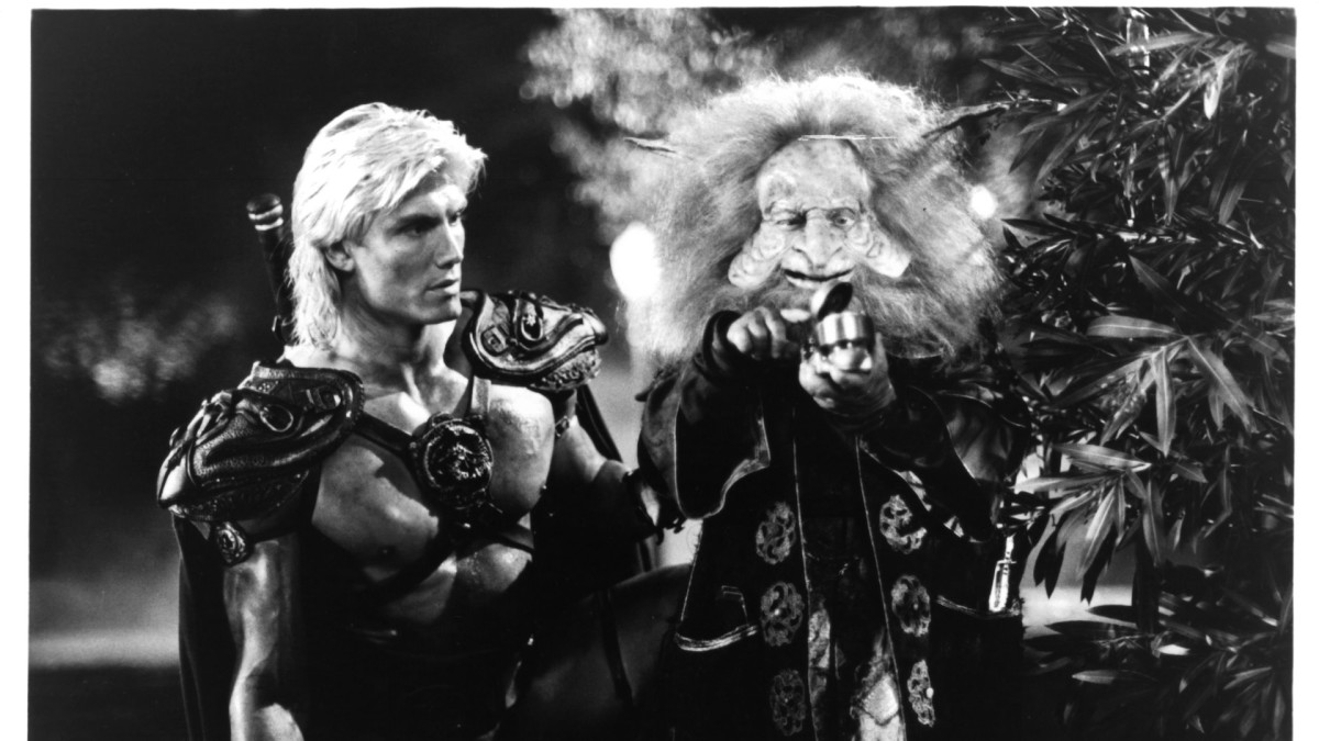Dolph Lundgren and Billy Barty search for the Cosmic Key in a scene from the film 'Masters Of The Universe', 1987. (Photo by Cannon Group/Getty Images)