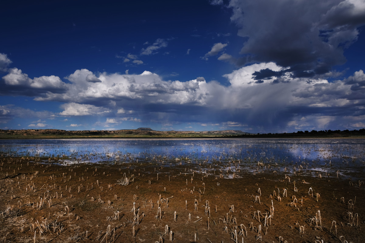 THOREAU, NEW MEXICO - JUNE 06: A dried out lake stands near the Navajo Nation town of Thoreau on June 06, 2019 in Thoreau, New Mexico. Due to disputed water rights and other factors, up to 40 percent of Navajo Nation households don’t have clean running water and are forced to rely on weekly and daily visits to water pumps. The problem for the Navajo Nation, a population of over 200,000 and the largest federally-recognized sovereign tribe in the U.S., is so significant that generations of families have never experienced indoor plumbing. Rising temperatures associated with global warming have worsened drought conditions on their lands over recent decades. The reservation consists of a 27,000-square-mile area of desert and high plains in New Mexico, southern Utah and Arizona. The Navajo Water Project, a nonprofit from the water advocacy group Dig Deep, has been working on Navajo lands in New Mexico since 2013 funding a mobile water delivery truck and digging and installing water tanks to individual homes. (Photo by Spencer Platt/Getty Images)