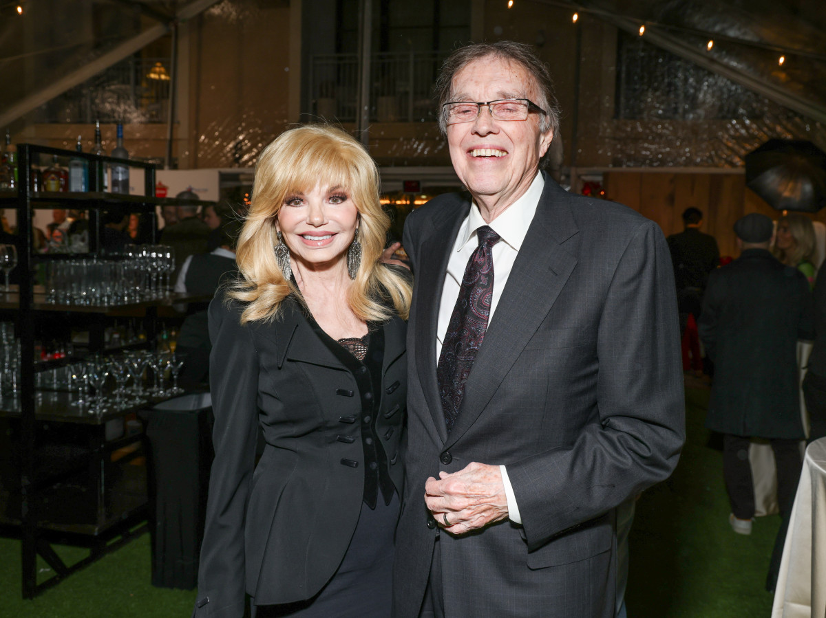 Loni Anderson and Bob Flick at Lifetime's holiday celebration as stars from "It's A Wonderful Lifetime" honor Blue Star Families military spouses, who will receive the Gift of a Lifetime, held at The Maybourne Bevelry Hills on November 28, 2023 in Beverly Hills, California.