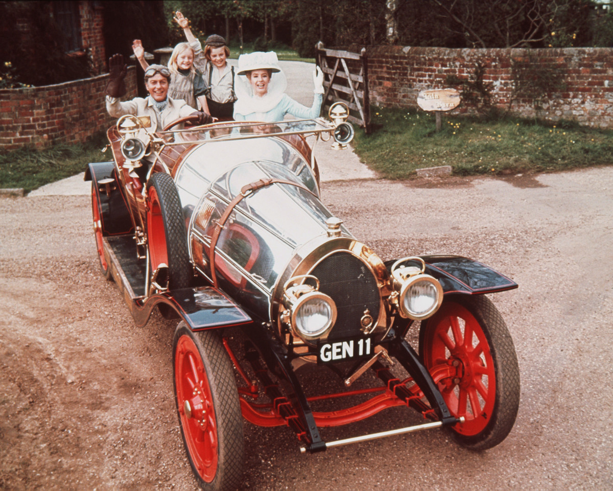 Dick Van Dyke, Heather Ripley, Adrian Hall and Sally Ann Howes sit waving from their seats in the car, in a publicity portrait issued for the film , Chitty Chitty Bang Bang', 1968. The 1968 musical, directed by Ken Hughes (1922–2001), starred Van Dyke as 'Caractacus Potts', Ripley as 'Jemima Potts', Hall as 'Jeremy Potts', and Howes as 'Truly Scrumptious'. (Photo by Silver Screen Collection/Getty Images)