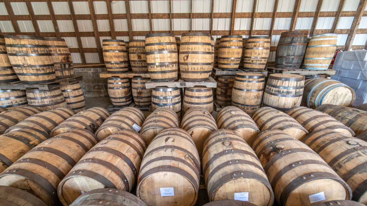 Whiskey Barrels in a Warehouse