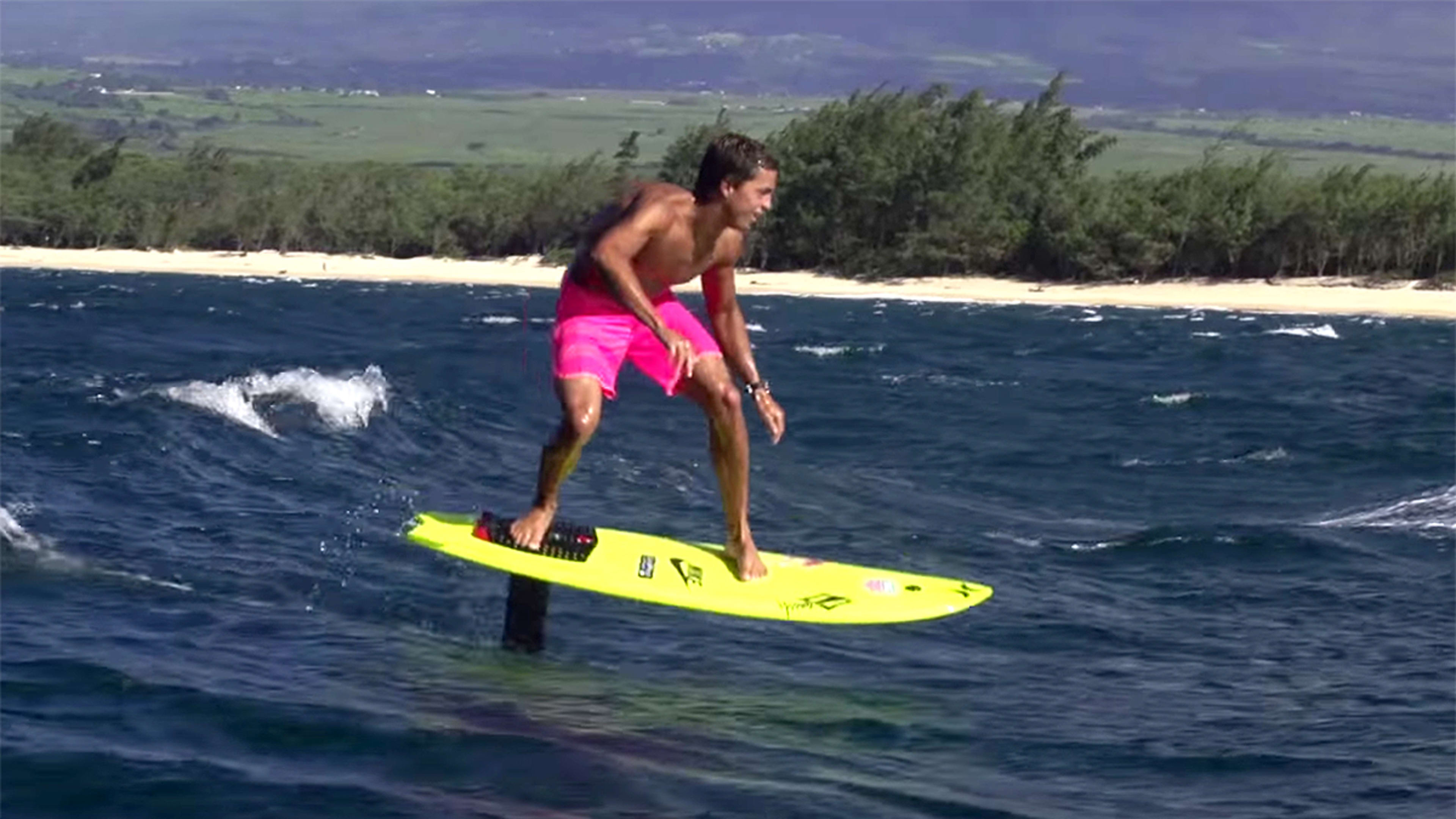 Kai Lenny surfs his 'self-propelled' foil board on open ocean