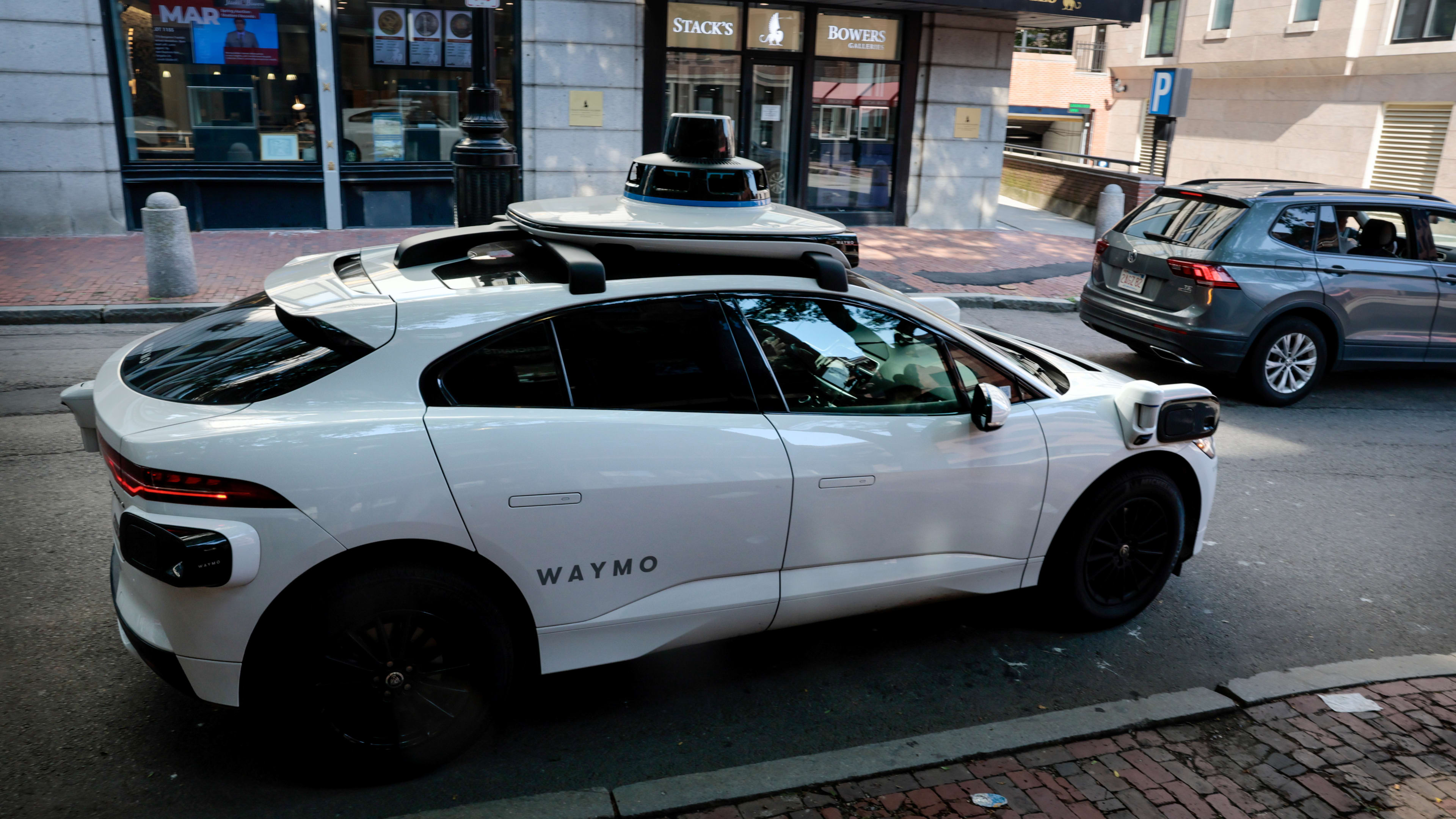 Waymo Robotaxis Crash at Airport, Sparking Multiple Tesla Debates - Men ...