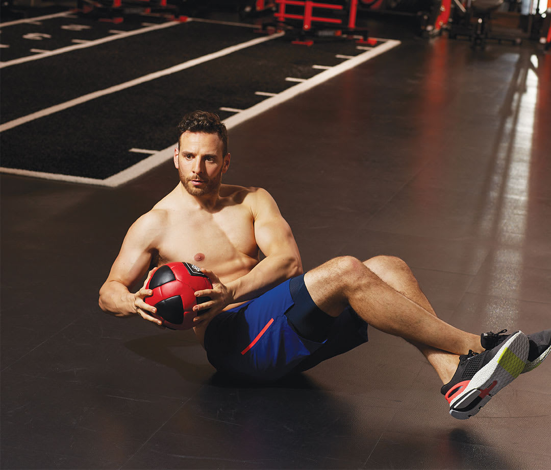 Russian Twist obliques exercise as part of Best Abdominal Obliques Workout
