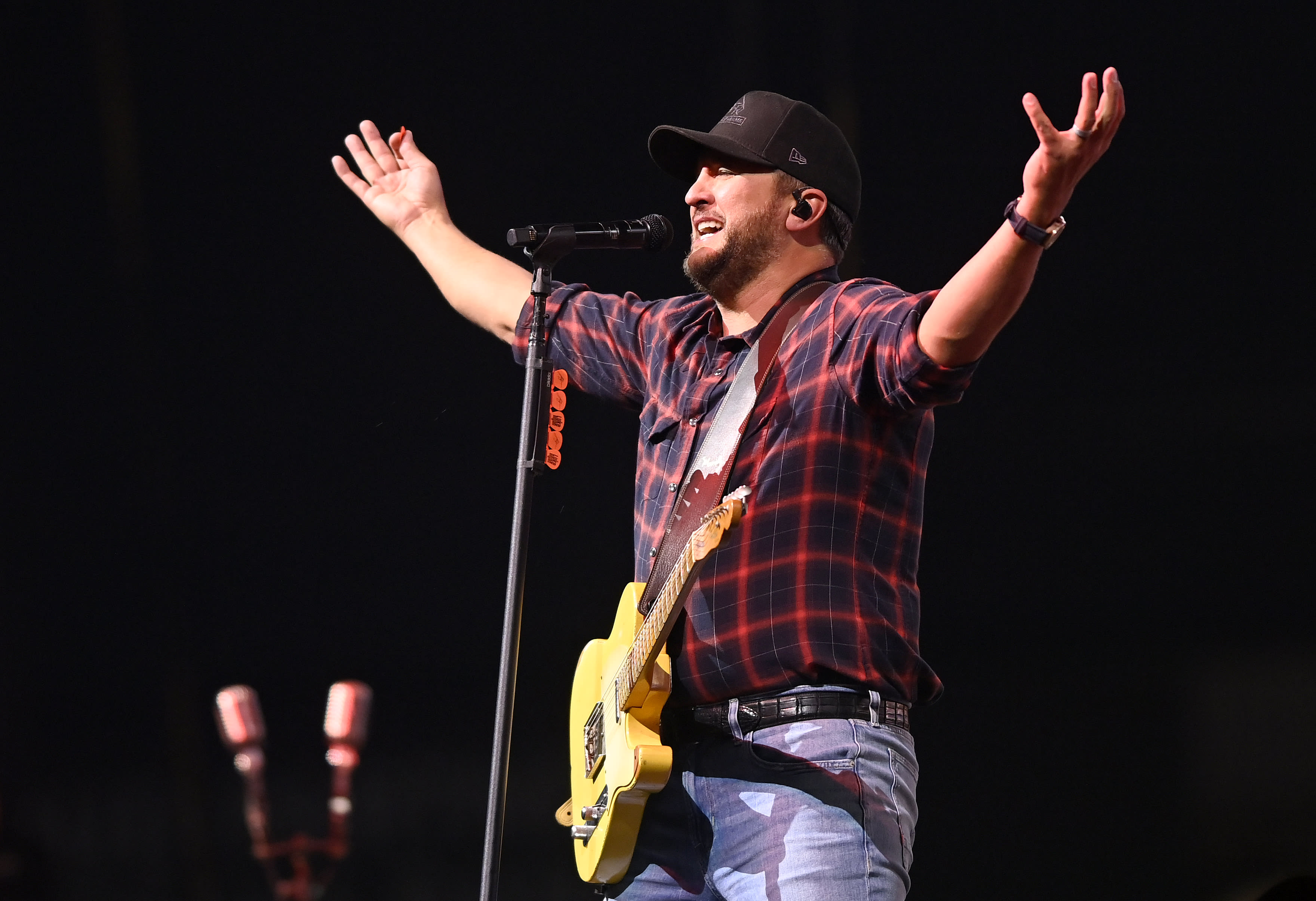 ARLINGTON, TEXAS - MARCH 08: Artist Luke Bryan performs during The American Performance Horseman by Teton Ridge at Globe Life Field on March 08, 2024 in Arlington, Texas. (Photo by Click Thompson/Getty Images for Teton Ridge)